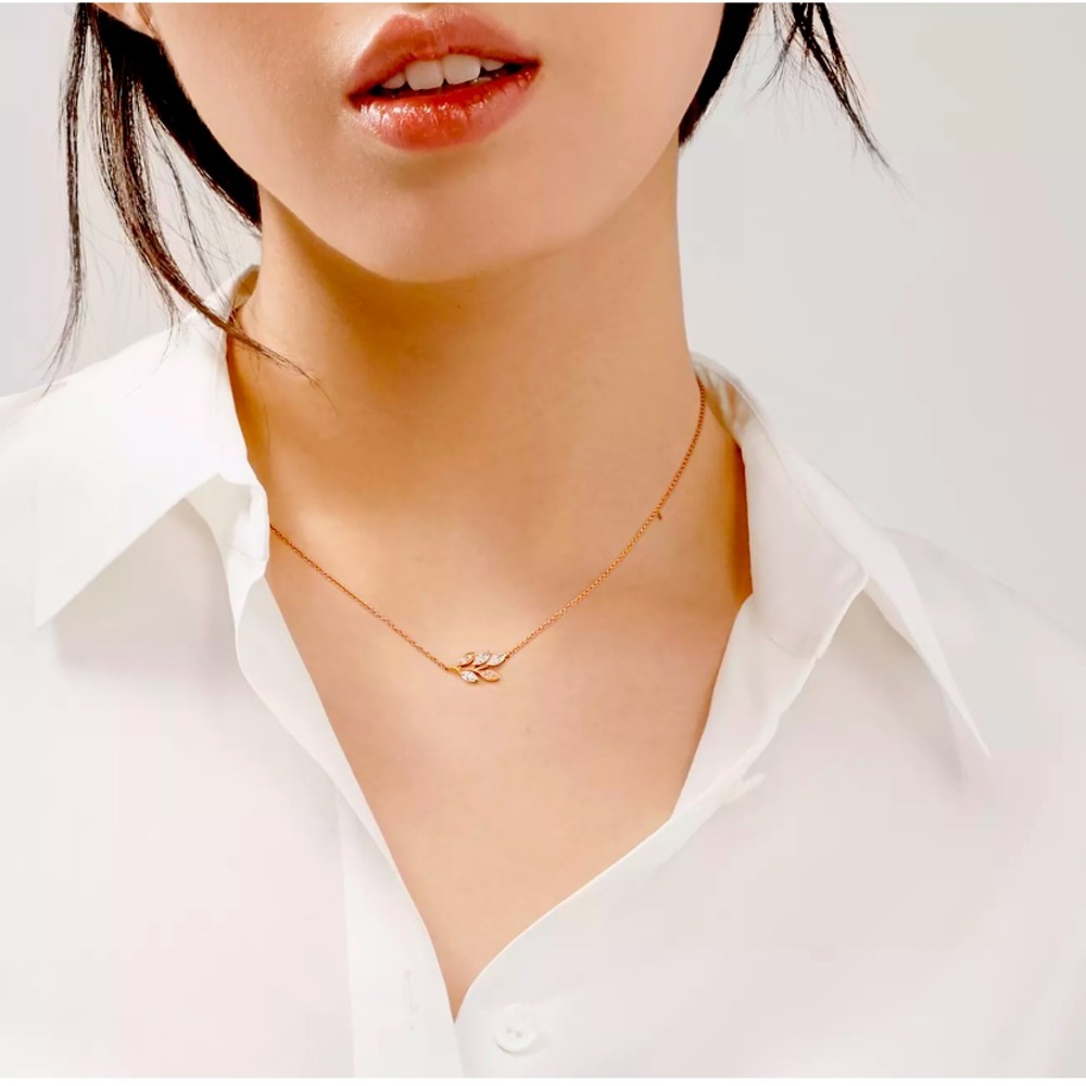 Tiffany & Co diamond vine pendant. Rose gold and diamond necklace